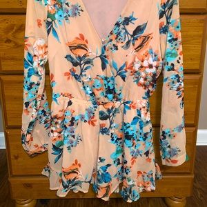 Carapace flower romper. Size small.